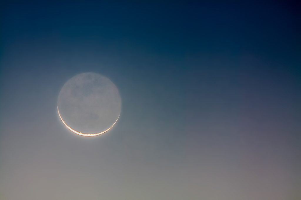 a soft moonlit sky