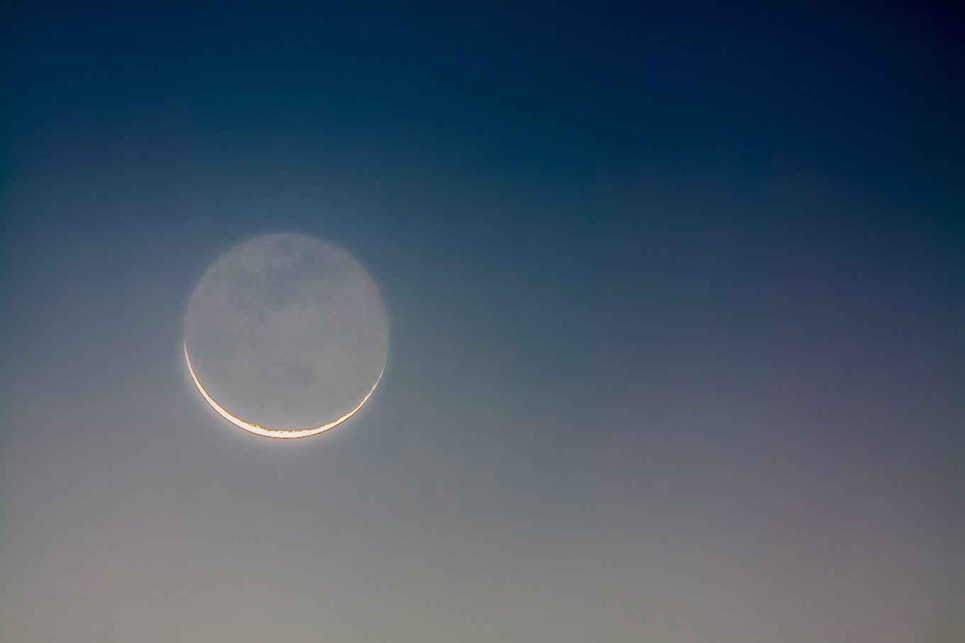 a soft moonlit sky